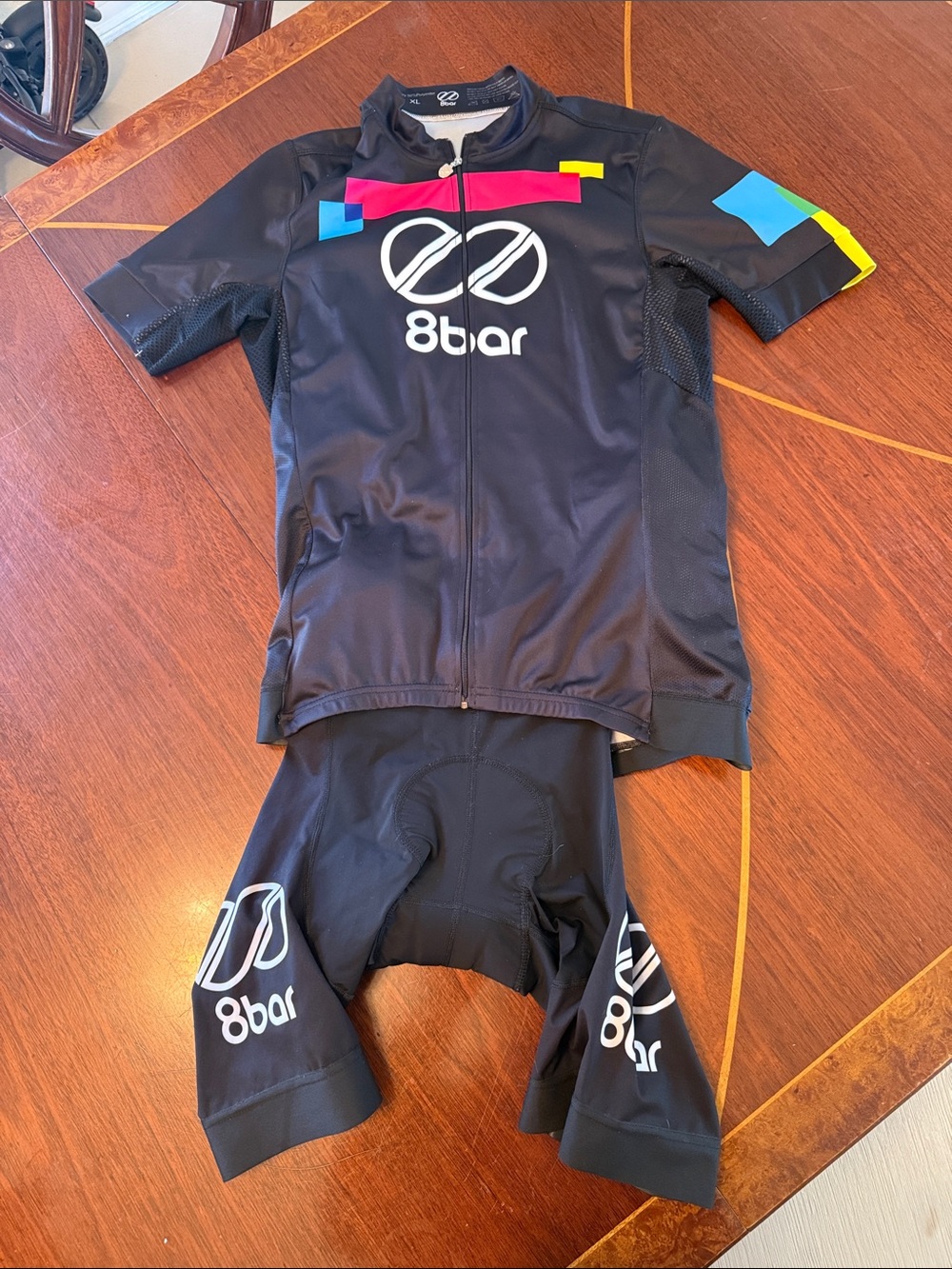 8bar team full kit.  XL jersey L bibs  arm warmers and hat. All never worn.